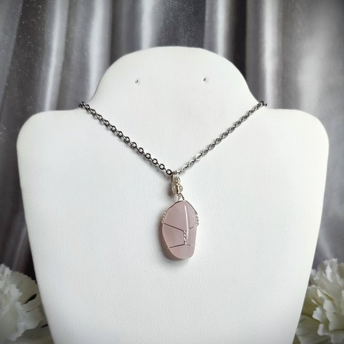 Rose quartz wire wrapped pendant in silver.