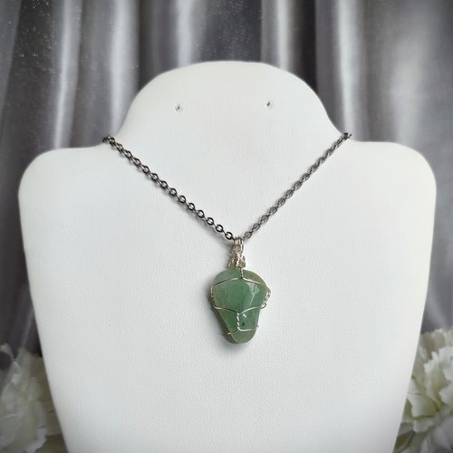 Green aventurine wire wrapped pendant in silver.