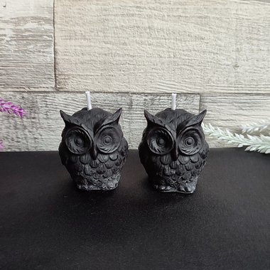 Black owl candle made from natural solid beeswax.