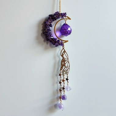 Brass suncatcher with moon, amethyst, purple crystal sphere, mystic hand and amethyst clusters.