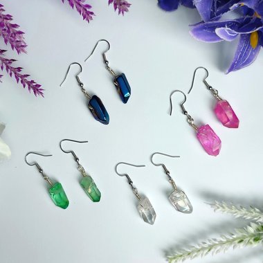 Wire wrapped titanium quartz crystal dangle earrings.