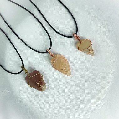Moonstone wire wrapped pendant in gold, rose gold or copper with cord.