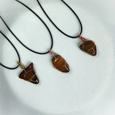 Tiger's eye wire wrapped pendant in gold, rose gold or copper with chain or cord.