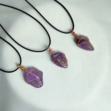 Amethyst wire wrapped pendant in gold, rose gold or copper with cord.