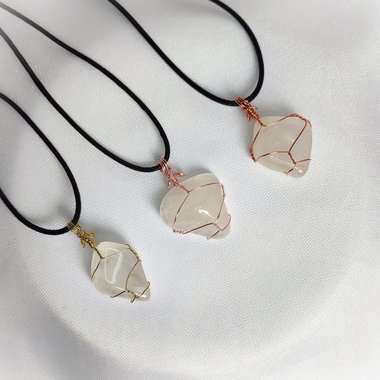 Quartz tumblestone wrapped in gold, rose gold or copper wire.