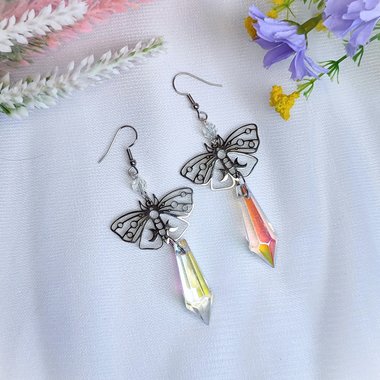 Butterfly earrings with glass crystal drops.