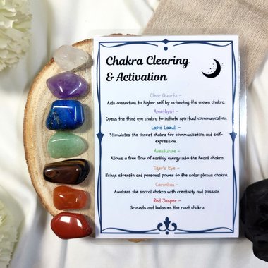 Crystal set for clearing and activating seven chakras with quartz, amethyst, lapis lazuli, aventurine, tiger's eye, carnelian, red jasper and information guide.