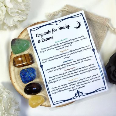 Crystal set for exams, study and revision with rainbow fluorite, tiger's eye, lapis lazuli, smokey quartz, orange calcite and information card.
