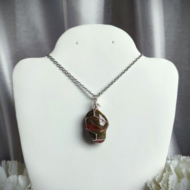 Unakite wire wrapped pendant in silver with chain or cord.
