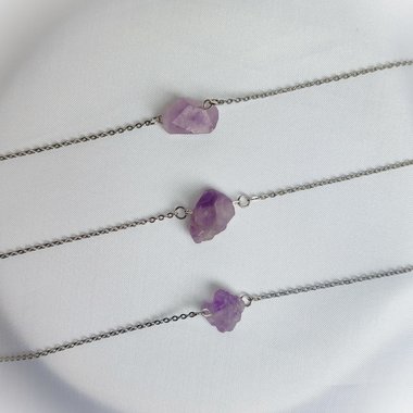 Raw amethyst cluster choker-style necklace with chain.