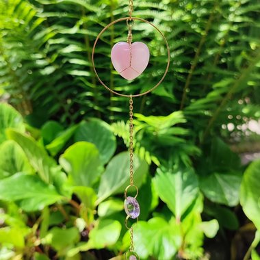 Rose quartz heart suncatcher with pink glass crystals. 