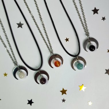 Silver moon pendant with gemstone beads.