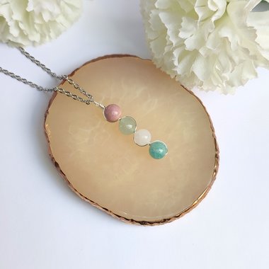 Gemstone beaded pendant with rhodochrosite, green aventurine, rose quartz and amazonite.