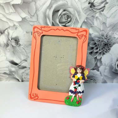 Refurbished photo frame with fairy decoration for adults or children.
