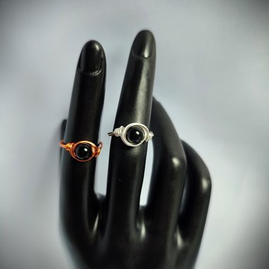 Black obsidian wire wrapped ring with silver plated or copper band.