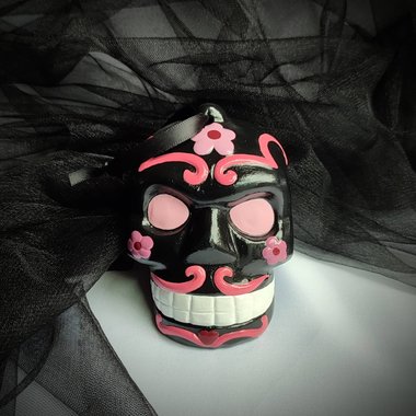 Day of the Dead pink and black sugar skull hanging ornament.